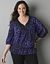 Embellished animal print blouse by Lane Bryant