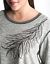 Embellished feather sharkbite top by Lane Bryant